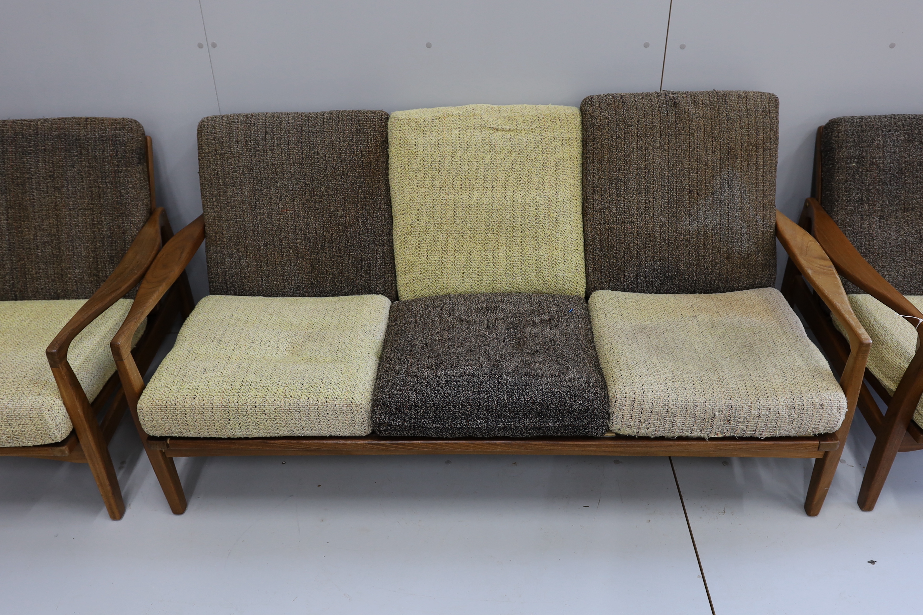 In the manner of Zenon Baczyk, a mid century teak three piece lounge suite, settee length 168cm, depth 88cm, height 68cm